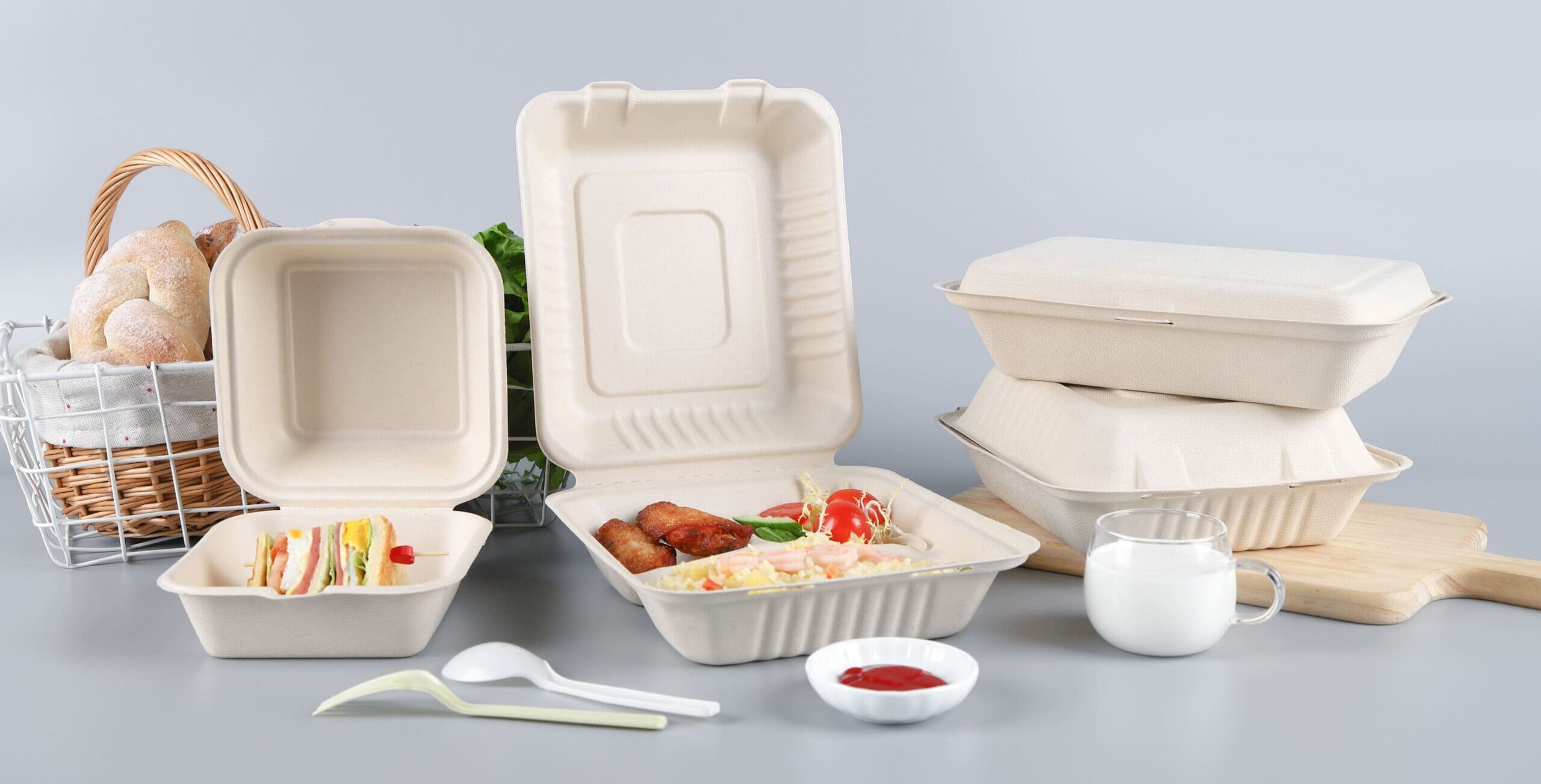 A business owner confidently choosing bagasse containers over plastic ones