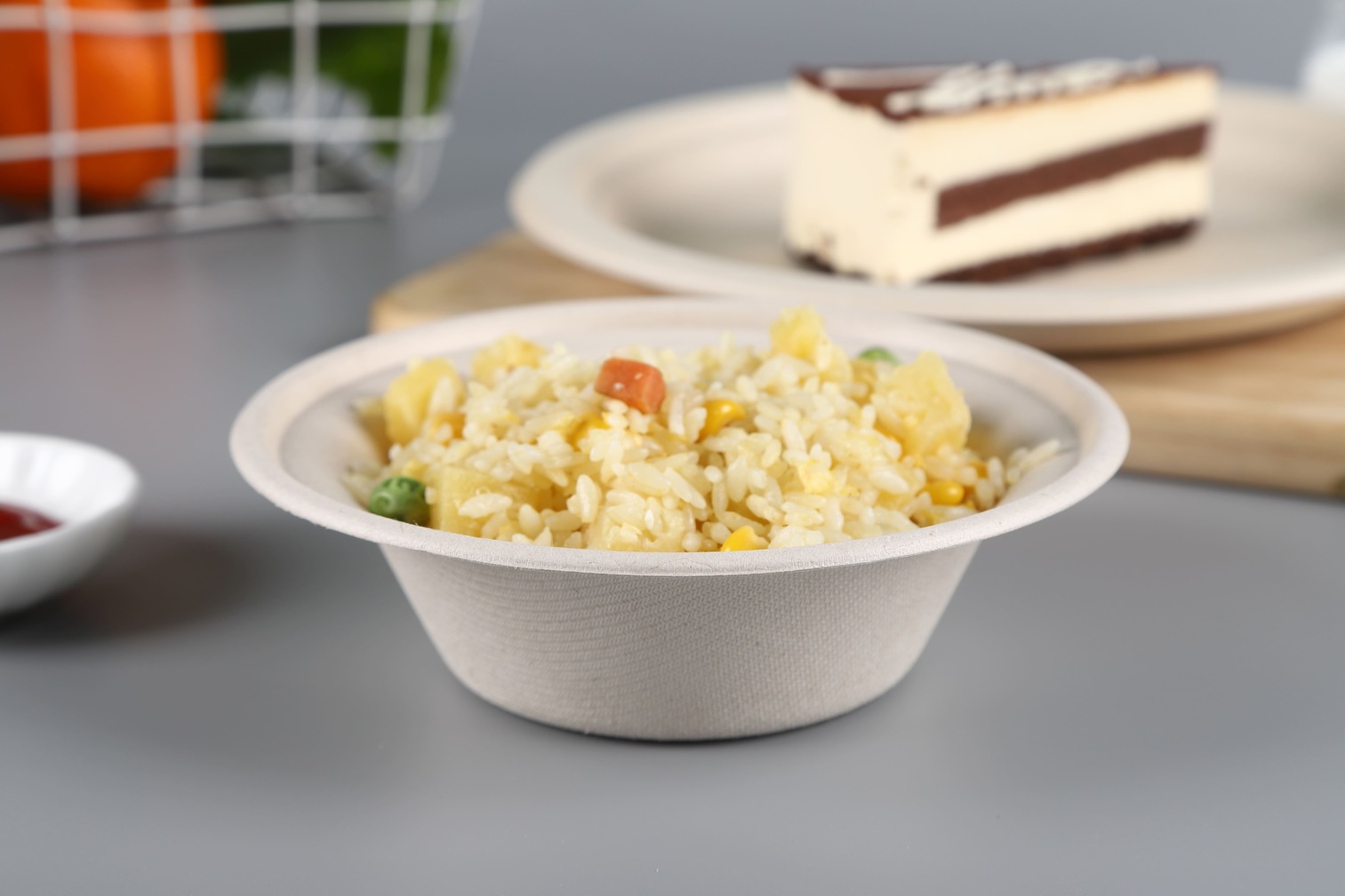 A close-up shot of steam rising from food in a sturdy bagasse bowl after microwaving