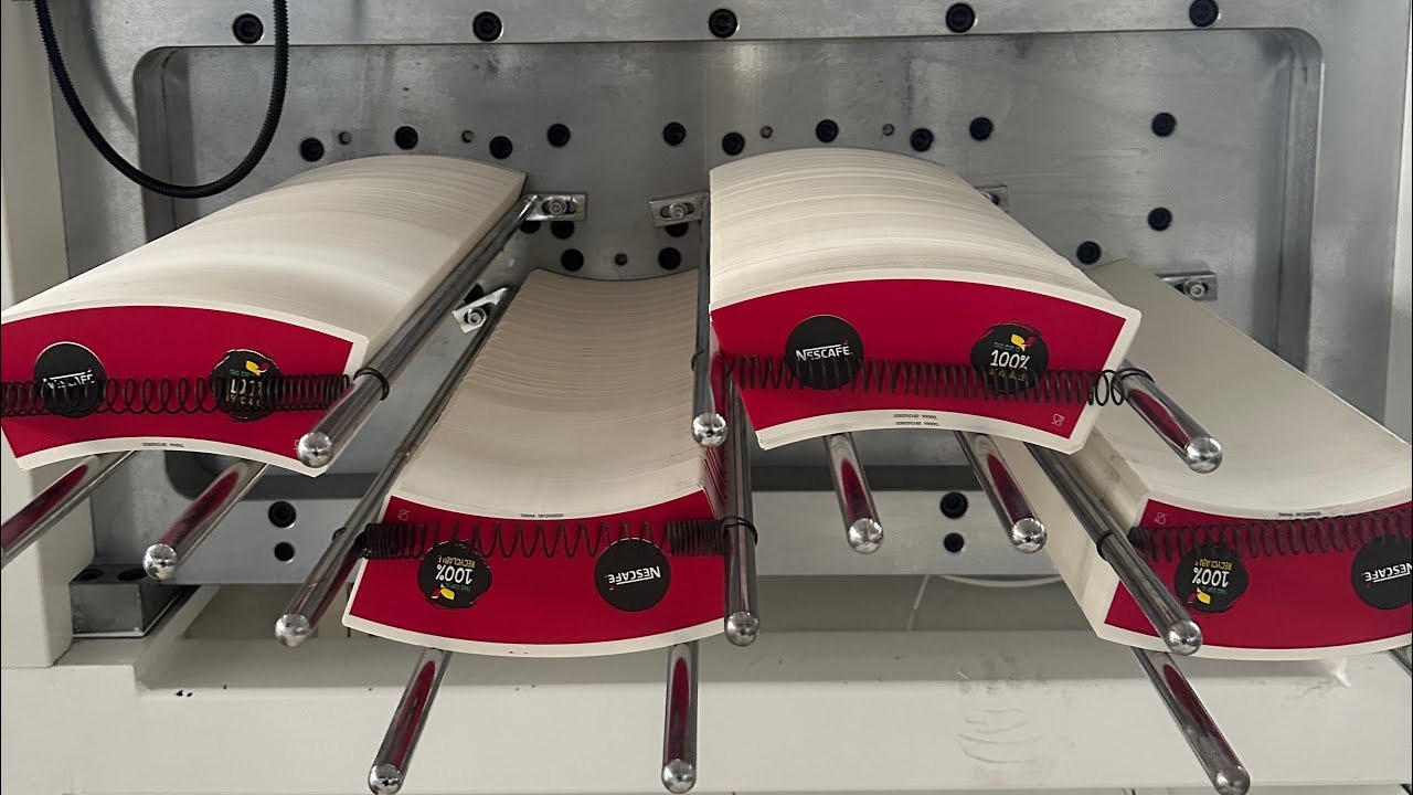 A machine die-cutting fan-shaped blanks for paper cups